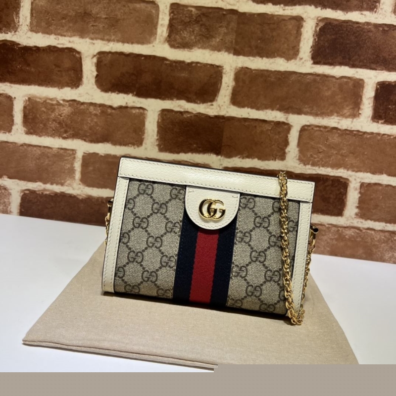 G*u*i clutch bags